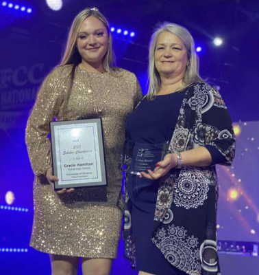 Gracie Hamilton was awarded the 2022 National Scholar Cheerleader of the Year and THS Cheer Coach Crissy Meador was named a finalist for the 2022 Cheer Coach of the Year Award at the FCC Nationals. Courtesy photo