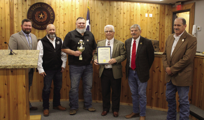 The City of Kaufman maintenance team is presented with an award for their float design at Kaufman’s 175th celebration. The Kaufman County Commissioners’ Court also recognized Bobby Bridges, whose final day was at the end of November. Photo by Bodey Cooper