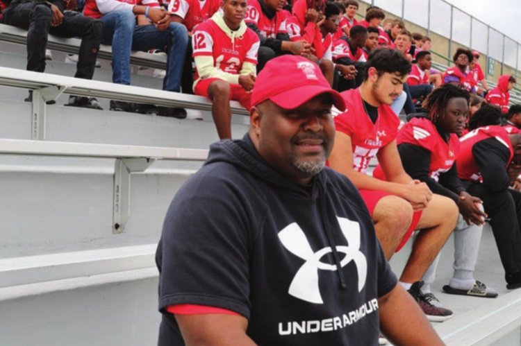 Tigers Head Football Coach Marvin Sedberry and his team showed up at the UIL District Marching Competition in Mesquite last week to lend support to the Tigers Marching Band, which has advanced to Area competition. (COURTESY TISD OFFICE OF COMMUNICATIONS AND MARKETING)