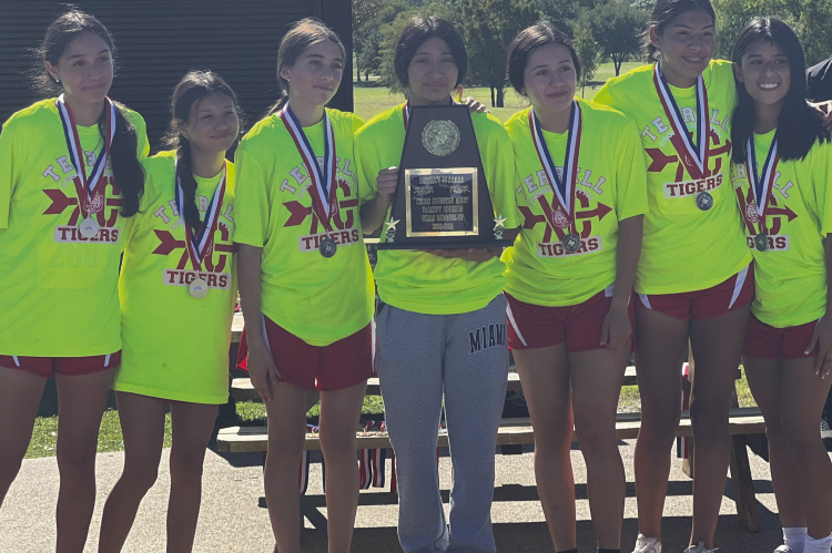 The Terrell Tigers varsity girls’ cross country team is headed to the Regional meet after taking second overall at the District meet in Crandall Oct. 9. Photo courtesy of Joe Stephens