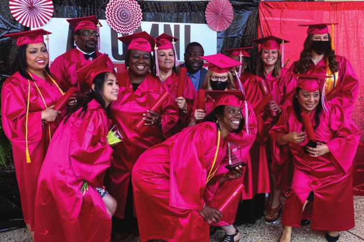 Fifteen Terrell staff members recently earned associated degrees through TVCC as part of the TISD’s College for all Tigers program. COURTESY PHOTO