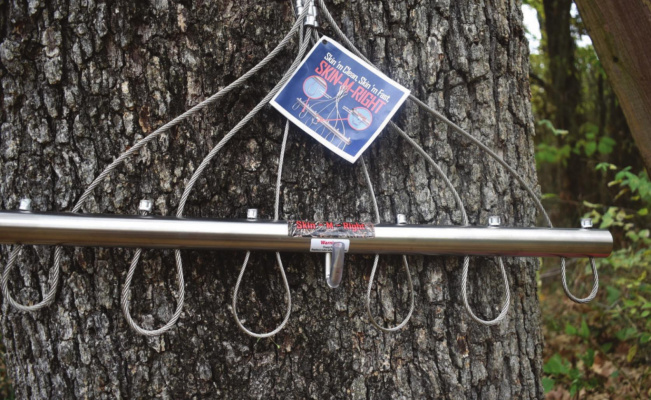 Outdoor folks can be difficult to shop for. Hopefully this week’s column will help you choose the just right gift. Pictured is an innovative Skin M Right gambrel for hanging game animals. PHOTO BY LUKE CLAYTON
