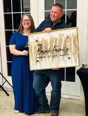 REACH Child Placing Agency hosted their annual Casino Night on Friday, March 21 at The Establishment Barn in Terrell. The night offered casino games, raffles, food, drinks and fun all benefitting REACH Child Placing Agency in Kaufman County. Brittany and Tristan Bosak were awarded Foster Family of the Year by REACH Child Placing Agency at their annual Casino Night. Photo by Mary Dlabaj