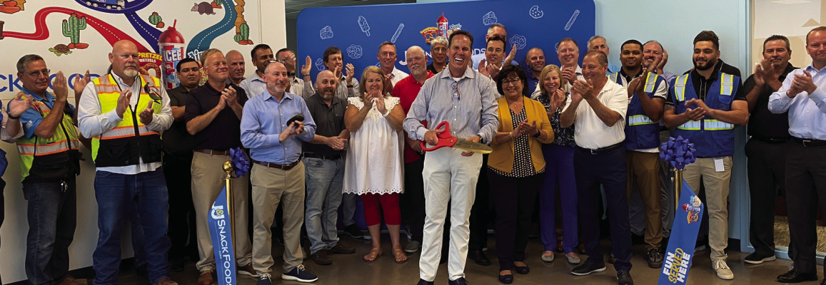 To celebrate the opening of J&amp;J Snack Foods’ first owned and operated distribution center, Dan Fachner, President &amp; CEO, along with the Company’s Executive Leadership Team and employees from the new center hosted an intimate ribbon cutting ceremony July 18 in Terrell. Photo courtesy of J&amp;J Snack Foods