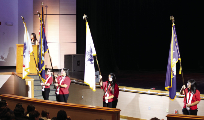 The opening of the program kicked off with an armed forces salute and recognition of the military service flags for the four branches of the Army, Navy, Air Force and the Marines. Photo by Bodey Cooper
