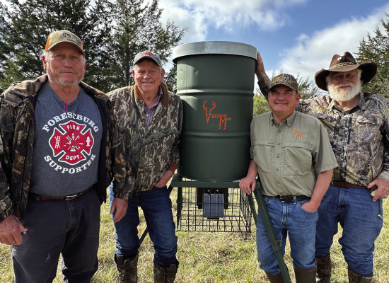 Setting up a Vineyard Max deer feeder on the Gresham Ranch after a bit of scouting. Photo by Luke Clayton