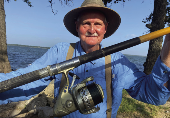 Charles Glasscock has been catching catfish at Wind Point Park for more than 50 years, using ‘Big Yellow,’ the long distance casting rod he built back in 1959. Photo by Luke Clayton