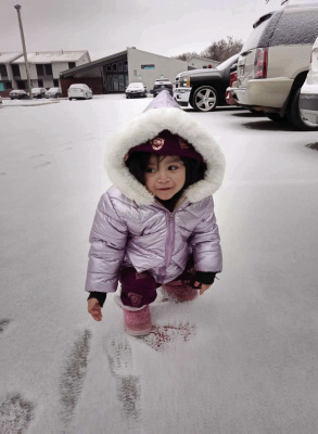 Two-year-old Daleyza Yanez enjoys her first snow Monday, Jan. 15 after an artic blast made a visit to the City of Terrell. Photo courtesy of Iridiana Delacruz