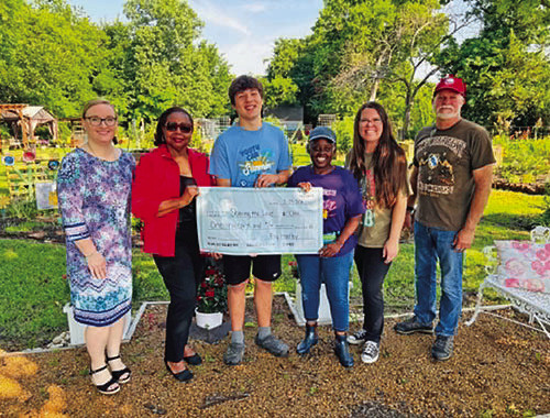 Fay Headley of Edward Jones made a generous donation to Sharing the Love Foundation on Friday, May 29. Food harvested from the Sharing the Love Foundation’s Children’s Legacy Gardens is donated throughout Kaufman County.