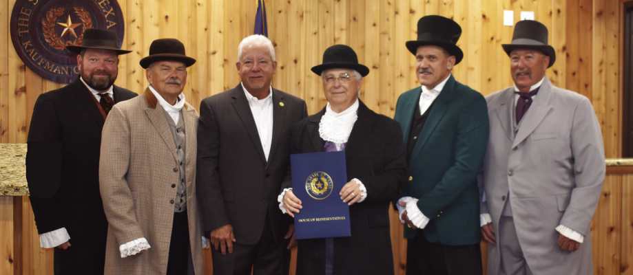 State Representative Keith Bell (third from left) delivers a resolution celebrating 175 years of Kaufman County to Commissioner Tommy Moore (from left), Commissioner Skeet Phillips, County Judge Jakie Allen, Commissioner Terry Barber and Commissioner Mike Hunt at the Kaufman County Commissioners’ Court meeting Oct. 10. County officials are dressed in period garb from the start of the county. Photos by Di Johnson