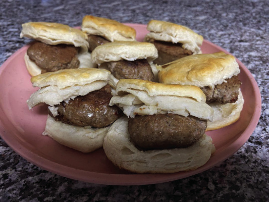 Some tasty spicy breakfast sausage and biscuits make a quick early morning snack at hunting camp. Photo by Luke Clayton