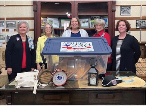 Pictured are Charlene Orr, co-chair of the project (from left to right); Cynthia Goode, King’s Fort Chapter Regent; Camille Chen, Terrell ISD social studies coordinator; Kathy Goldsmith, co-chair of the project; and Jessica King, Terrell Heritage Museum Administrator. Eighteen classrooms will be able to use the America 205! Celebration trunk as an introduction to life during the Revolution. Photo courtesy of Charlene Orr