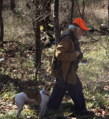 Donny Lynch with one of his prized squirrel dogs. Photo by Luke Clayton