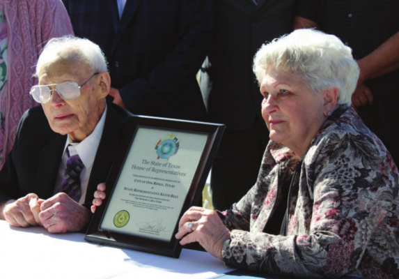Robert LaRue, 105, and his daughter, Oak Ridge City Councilwoman Janelle Davis, sit with the House of Representative certificate that formally recognizes the new park’s name. HANK MURPHY PHOTO