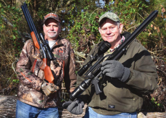 Luke Clayton, at right, and his buddy Jeff Rice heading out on a hog hunt with their big bore air rifles chambered for .45 and .50 caliber. PHOTOS BY LUKE CLAYTON