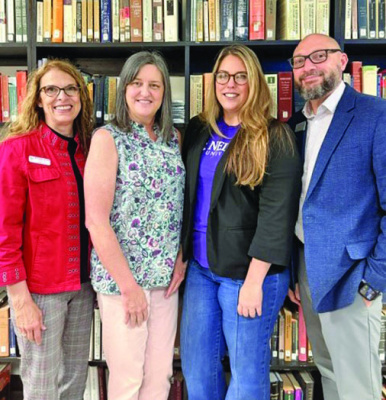 Dr. Anne Horan (from left) and Debbie Dominguez with Poetry Community Christian School and Heather Orrill and Dr. Hartman with Nelson University. Photo courtesy of PCCS