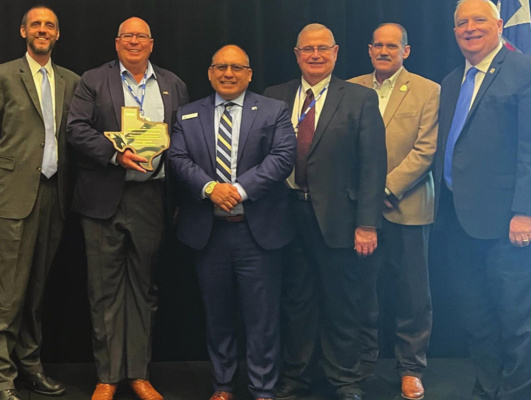 The Terrell contingent celebrated awards handed out at the Texas Economic Development Council’s annual conference on Oct. 14. From left: City Manager Mike Sims, EDC President Ray Dunlap, Mayor Rick Carmona, EDC board Chairman Bruce Wood, Precinct 3 County Commissioner Terry Barber, Chamber of Commerce President Carlton Tidwell. (COURTESY PHOTO)