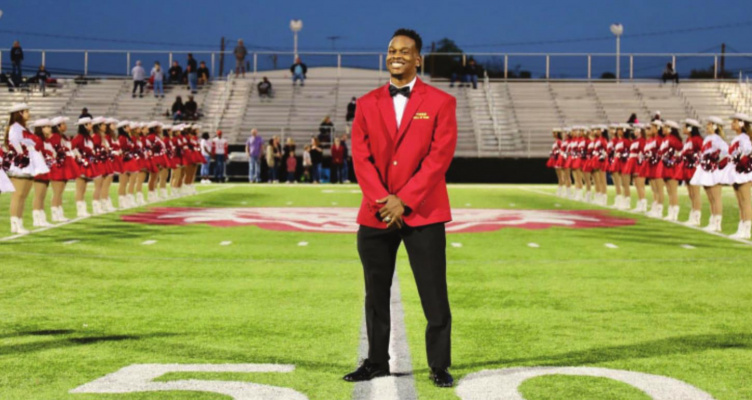 Year 2021 inductee Dwight Gentry II is recognized on the field during halftime of the Oct. 15 football game against Paris.