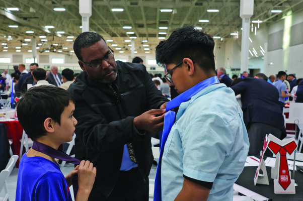 The Boys to Men Breakfast returned to Terrell ISD on March 12 with a rousing success as many citizens and staff showed up to help teach young men how to tie a tie and share their life knowledge. Additional photos on 8A. Photo courtesy of Terrell ISD
