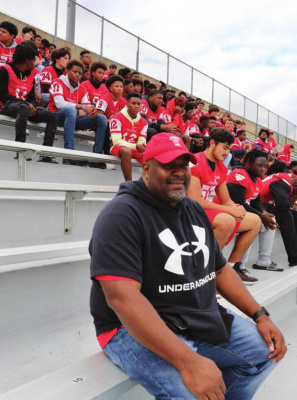 Tigers Head Football Coach Marvin Sedberry and his team showed up at the UIL District Marching Competition in Mesquite last week to lend support to the Tigers Marching Band, which has advanced to Area competition. (COURTESY TISD OFFICE OF COMMUNICATIONS AND MARKETING)