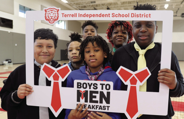 Many men showed up and helped teach Terrell ISD sixth grade scholars with fellowship and teaching them how to tie a necktie Feb. 23. Terrell ISD Athletic Director Marvin Sedberry also provided words of wisdom and encouragement. Photo courtesy of Terrell ISD