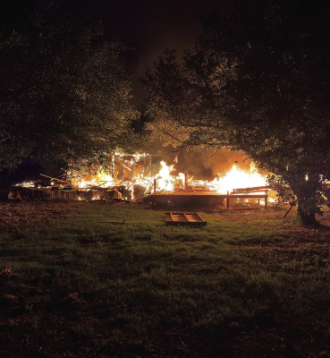 Terrell volunteer firefighters, alongside the Ables Springs Fire Department assisted in containing an intentional fire set July 21. As the units were dispatched to the area of County Roads 322 and FM 429, both departments found a singlewide mobile home that was no longer needed set ablaze by the residents. The fire was eventually extinguished, and an investigation has been requested by the Kaufman County Fire Marshal’s Office regarding the incident. Photo courtesy of Terrell VFD