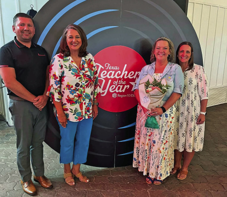 Furlough Middle School teacher Heather Ray (middle, right) was named the Region 10 Teacher of the Year and honored during a Terrell ISD luncheon on Thursday, July 30. See more photos on page Photo courtesy of Terrell ISD