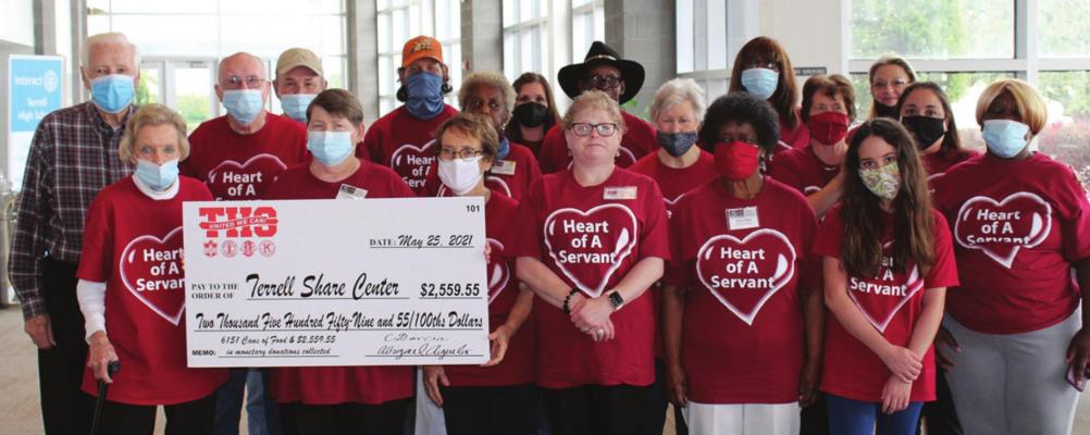 About 20 Terrell Share Center volunteers were on hand to take part in Tuesday’s United We Can donation ceremony at the Jaime Foxx Performing Arts Center. HANK MURPHY PHOTO