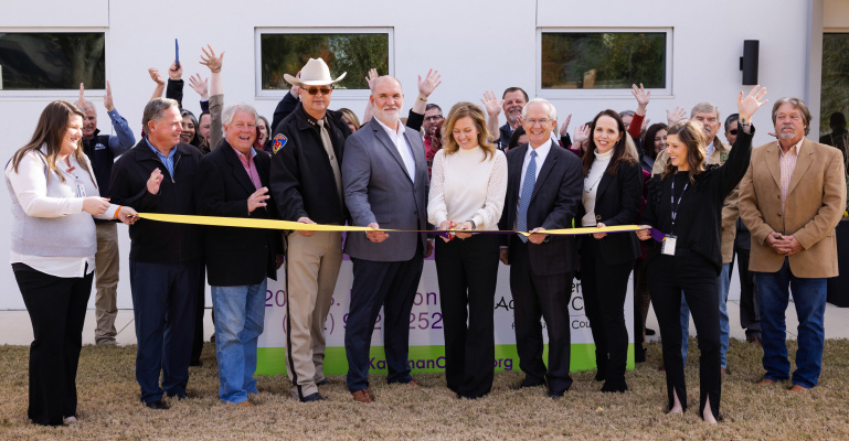 A special ribbon cutting and dedication ceremony was held last week for the newly expanded home of The Children’s Advocacy Center of Kaufman. The 10,000-square-foot building includes counseling suites, interview rooms, medical evaluation room, resource room and more. Photo by Simon Luna