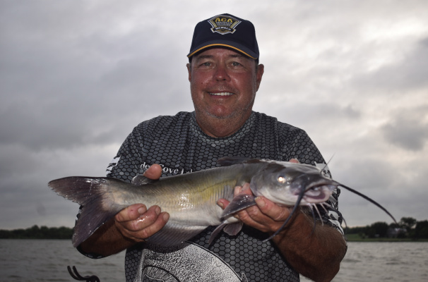 Channel catfish are in shallow water next to shore feeding on the recent shad hatch during the first few hours of daylight each day. Lake Tawakoni Guide Tony Pennebaker shows off a ‘good eater.’ Photo by Luke Clayton