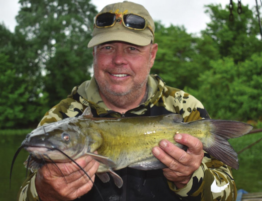 Lake Tawakoni guide Tony Pennebaker with a good eating channel catfish. Photo by Luke Clayton