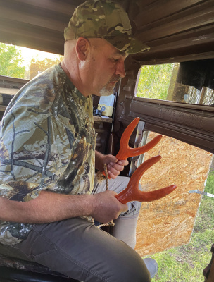 Luke’s friend and neighbor Kenneth Shepherd rattling in a buck on opening morning. Photo by Luke Clayton
