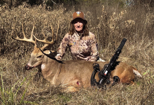 Carol Little with a fine buck she took last week at the Choctaw Hunting Lodge in southeast Oklahoma. Carol and her husband Mark bought the hunt through an auction at the Dallas Safari Club. The Choctaw Nation is a strong supporter of DSC and shows support through donating hunts such as this. Photo Courtesy of Luke Clayton