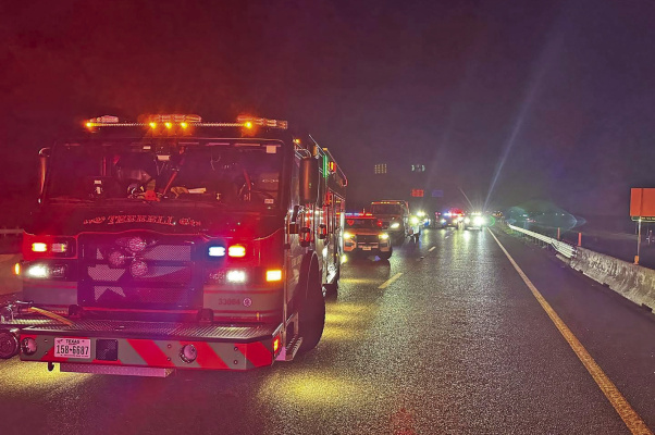 Multiple agencies work a two-vehicle crash at Windmill Farms Boulevard that claimed three lives on U.S. Highway 80 in Forney near Terrell on Sunday, July 26. Photo courtesy of Terrell Volunteer Fire Department
