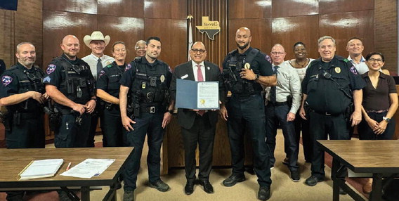 Mayor Rick Carmona, along with the Terrell City Council, gave a proclamation to Terrell Police Department Chief Arley Sansom and other members of Terrell PD in recognition of National Police Week during the May 13 city council meeting. Photo courtesy of City of Terrell