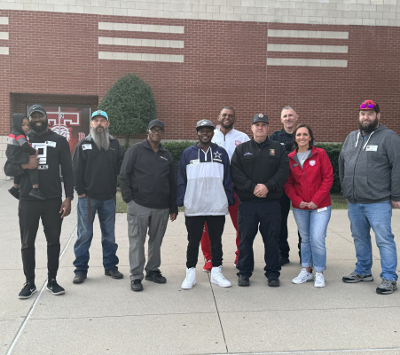 The first Furlough Middle School “Dudes at the Door” event was a complete success. Many volunteers came out Nov. 14 to welcome students with a high five, fist-bump and an encouraging word as they started their school day. A few participants had already left before the picture, but FMS had 13 men in the community show up and show their support for students. Photo courtesy of Terrell ISD Facebook page