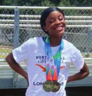 Janaria Jackson carved her name into the record books, clocking a 23.76 in the 200 meters at the State Track and Field Meet. Jackson added a second gold medal finish to her resume at the same event, finishing first overall in the 100 meter dash. COURTESY PHOTO