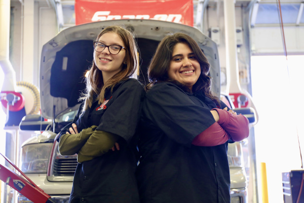 Bettie Blagowsky and Socorro Guerrero have earned high praise for their efforts in Terrell High School’s automotive program with instructor Blair Bryant noting, “No matter what I ask them to do they get it done.” Photo courtesy of Terrell ISD
