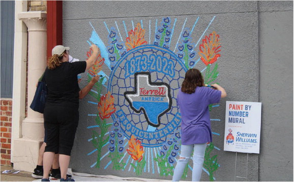 The City of Terrell hosted their Mural Walk Sept. 16 downtown. The walk included multiple amazing murals, including a Jamie Foxx mural, a mural for the No. 1 British Flying and Training School, the Lyric Center and even a paint-by-number mural at the beginning of the mural walk where visitors could choose their own color and contribute to the mural. Additional photos on 6A. Photo by Bodey Cooper