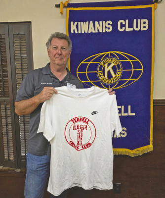 Terrell Chess Club gifts shirt to Kiwanis President