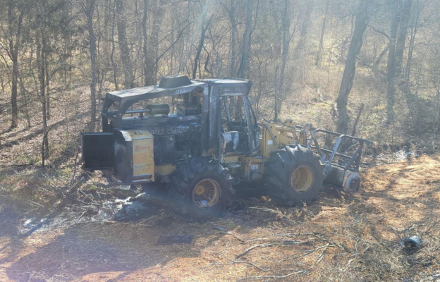 Members of the Terrell Volunteer Fire Department worked quickly to contain a fire involving a large tractor that was tasked with clearing trees near a rail line east of the city. Photo courtesy of TVFD Facebook page