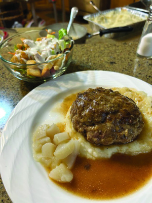 Luke enjoyed this dish of ground oryx hamburger steak prepared by Nacolh Vickrey at the Choctaw Hunting Lodge in Southeast Oklahoma last week. Hands down, this is one of Luke’s favorite meals. Photo by Larry Weishuhn
