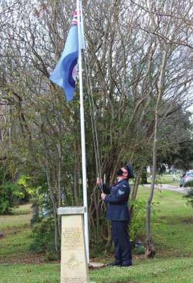 A Royal Air Force airman raises the RAF flag at Oakland Memorial Cemetery during last year’s Remembrance Day ceremony. (TRIBUNE FILE PHOTO)