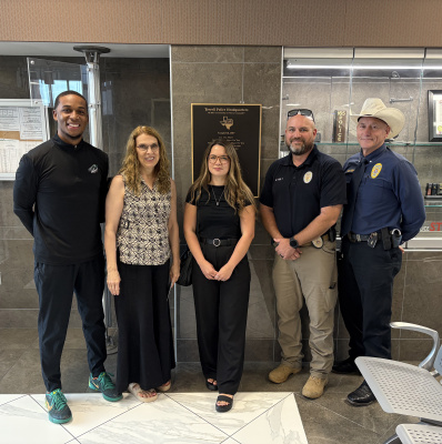 Poetry Community Christian School’s Athletic Department honored fallen Terrell Police Officer Jacob Candanoza with a monetary gift. Shown in photo is Mrs. Candanoza, Terrell Police Chief Arley Sansom, Officer Holt, PCCS President Dr. Horan and PCCS Athletic Director Kendrick Bryson. Courtesy photo