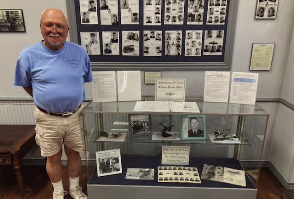 BFTS Museum’s volunteer historian, George Cozens, collected items from the museum’s collection to create this temporary exhibit dedicated to the career of former cadet Bill Olsen. Photo courtesy of Liz Oliphant