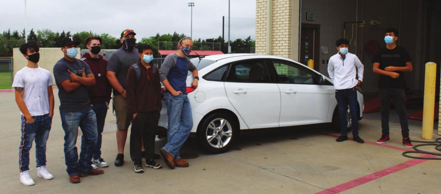 Auto tech students at Terrell High will learn to diagnose and repair problems on a modern automobile thanks to this donation by Platinum Ford. HANK MURPHY PHOTO