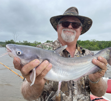 Guide David Hanson with one of many blue catfish he and Luke landed last week at Tawakoni, fishing the mouth of creeks. Photo by Luke Clayton