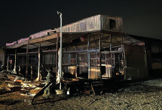 Terrell Volunteer Fire Departments, along with multiple other departments, extinguish a large stable fire in the area of Sheila Cir. Aug. 18. Multiple horses perished in the blaze and the barn was a total loss. Photo courtesy of Terrell Volunteer Fire Department