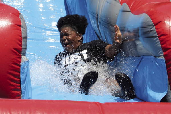 Blistering temperatures and high humidity levels did little to dampen the enthusiasm of the hundreds of visitors that made their way to Breezy Hill Park June 17-19 for this year’s local Juneteenth event. Attendees were able to take in live music, learn about Terrell’s rich history, enjoy food, fun and fellowship, and see the newly opened and dedicated basketball courts. Additional photos on 2A. Photo by David Kapitan