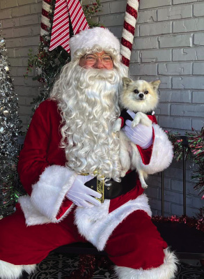 Santa made a stop into Historic Downtown Terrell at the Terrell Coffee Co. on Saturday, Nov. 30. Here he is pictured with the Terrell town dog. Photo courtesy of Terrell Chamber of Commerce